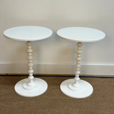 Sale Photo Thumbnail #46: Pair of contemporary white-painted side tables featuring round tops and bobbin-turned pedestal bases.