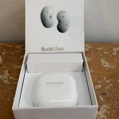 Sale Photo Thumbnail #152: Samsung Galaxy Buds Live wireless earbuds in white, presented in their original packaging.