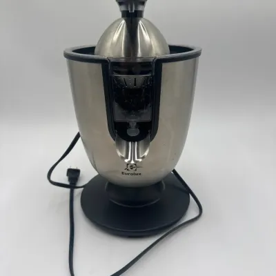 Sale Photo Thumbnail #93: Eurolux electric citrus juicer featuring a stainless steel finish and a black base, designed with a top press handle and a front-facing spout.