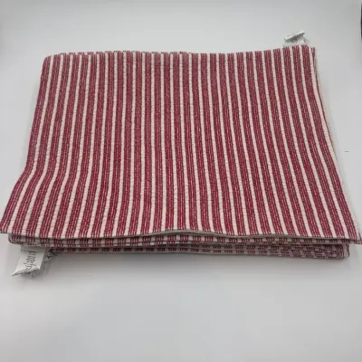 Sale Photo Thumbnail #120: Stack of red and white striped fabric placemats with a ribbed texture, showing original care tags.