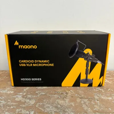 Sale Photo Thumbnail #114: Maono HD300 Series Cardioid Dynamic USB/XLR Microphone in its original retail packaging.