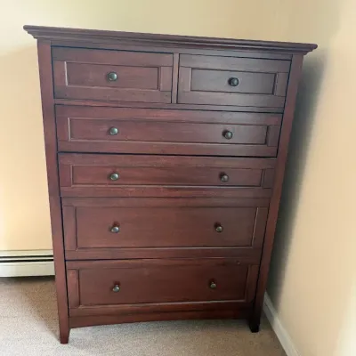 Sale Photo Thumbnail #50: Contemporary dark cherry wood tallboy chest of drawers featuring two small top drawers over four full-width drawers with dark metal knobs.