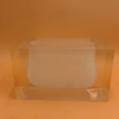 Sale Photo Thumbnail #84: Vintage Lucite block paperweight featuring a frosted, suspended inner shape, showing light surface wear.