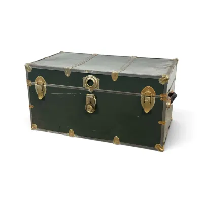 Sale Photo Thumbnail #53: Vintage metal steamer trunk in dark green and silver with brass-toned hardware, showing some light wear and scratches.