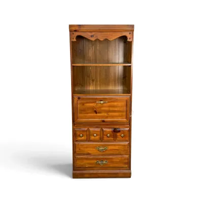 Sale Photo Thumbnail #67: Vintage knotty pine secretary desk with upper hutch shelving, a drop-front writing surface, and lower drawers with brass hardware.