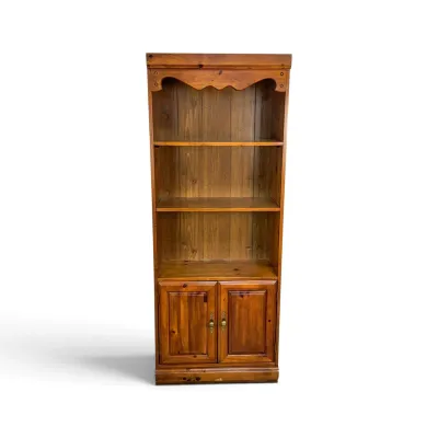 Sale Photo Thumbnail #66: Vintage pine hutch featuring three open shelves with a scalloped top valance and a lower two-door storage cabinet.