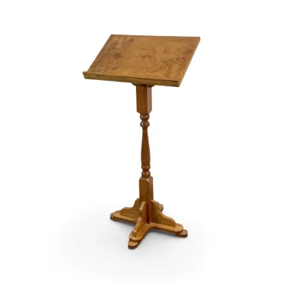Sale Photo Thumbnail #123: Vintage wooden lectern or dictionary stand featuring a turned pedestal column and a four-legged base.