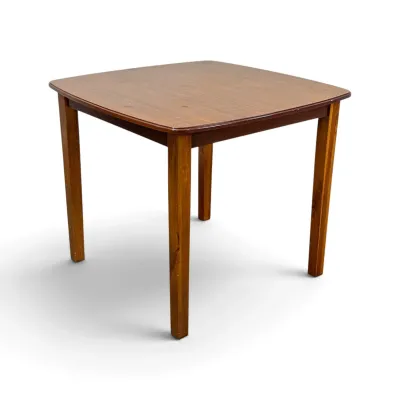 Sale Photo Thumbnail #170: Mid-century modern style square wooden dining or game table with tapered legs and a warm brown finish.