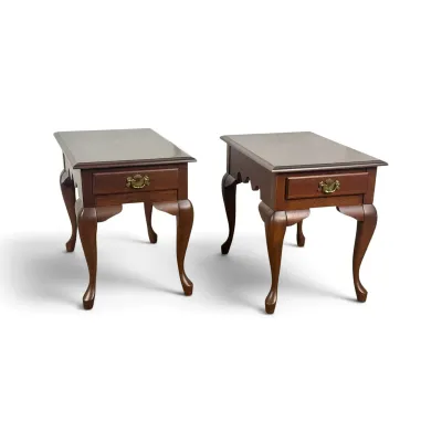 Sale Photo Thumbnail #92: Pair of Queen Anne style cherry end tables featuring a single drawer with brass batwing pulls and elegant cabriole legs.