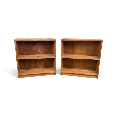 Sale Photo Thumbnail #274: Pair of vintage low wooden bookcases, each featuring a single fixed shelf and showing some wear and dust from age.