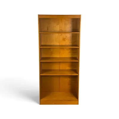 Sale Photo Thumbnail #90: Mid-century modern style wooden bookcase featuring five spacious shelves and a warm honey oak finish.