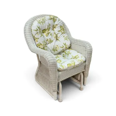 Sale Photo Thumbnail #181: Vintage white wicker glider armchair featuring a high back, rolled arms, and tufted floral cushions with a yellow and green botanical pattern.