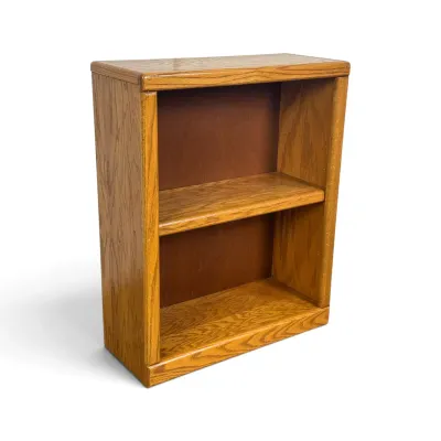 Sale Photo Thumbnail #96: Small oak veneer bookcase featuring a single adjustable shelf and a warm honey finish, circa late 20th century.