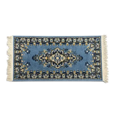 Sale Photo Thumbnail #282: Small rectangular Persian-style rug featuring a central medallion on a light blue field, bordered by intricate floral motifs and finished with white fringe.