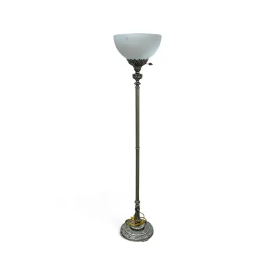 Sale Photo Thumbnail #187: Vintage torchiere floor lamp featuring an ornate silver-tone metal base and stem with a frosted white glass shade.