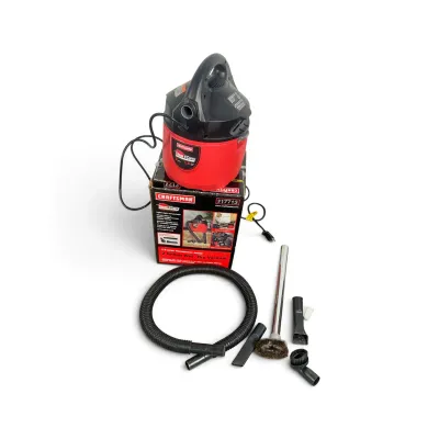 Sale Photo Thumbnail #87: Craftsman Clean 'N Carry 2-gallon wet/dry vacuum with original box, hose, and various nozzle attachments.