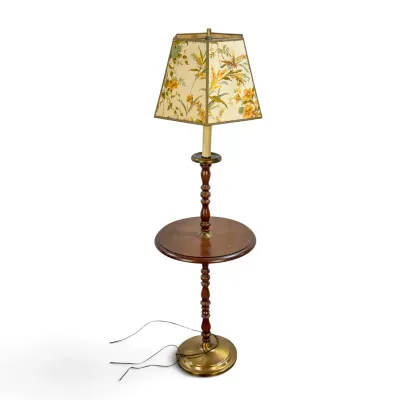 Sale Photo Thumbnail #52: Vintage floor lamp with integrated wooden tray table, turned wood post, brass base, and a floral-patterned hexagonal shade.