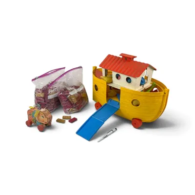 Sale Photo Thumbnail #21: Vintage Fisher-Price Noah's Ark toy boat with ramp, accompanied by two bags of play pieces and a small vintage pig pull toy.