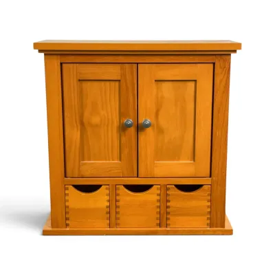 Sale Photo Thumbnail #73: Craftsman-style oak spice cabinet or jewelry chest featuring double doors with metal knobs and three lower drawers with finger-joint construction.