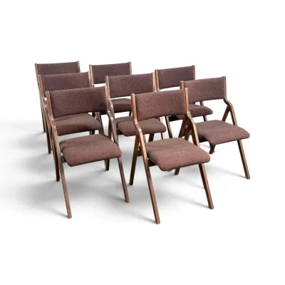 Sale Photo Thumbnail #108: Set of eight mid-century modern folding chairs featuring wooden frames and brown textured fabric upholstery.