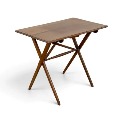Sale Photo Thumbnail #168: Antique wooden folding campaign table featuring a rectangular top, X-frame legs, and a turned stretcher.