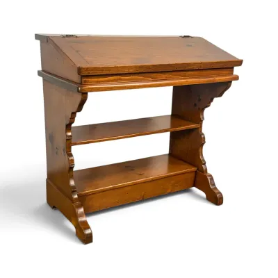 Sale Photo Thumbnail #95: Vintage pine slant-front desk with two lower shelves and scalloped side supports.