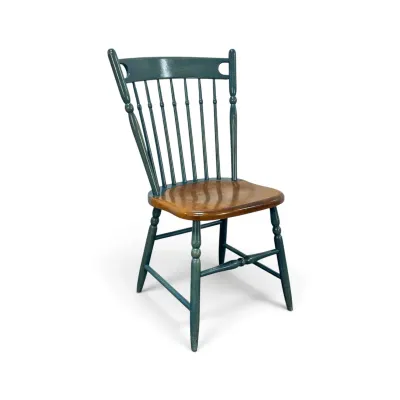 Sale Photo Thumbnail #185: Vintage Windsor-style dining chair featuring a teal-painted wooden frame with turned legs and a natural wood-finished seat.