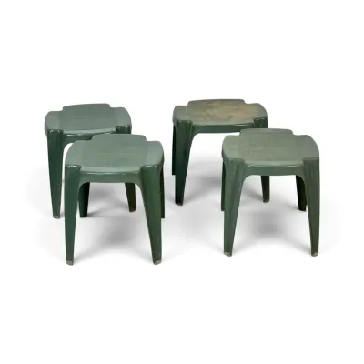 Sale Photo Thumbnail #252: Set of four green molded plastic outdoor stools, showing some wear and scuffs from use.