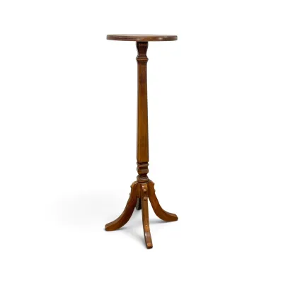 Sale Photo Thumbnail #192: Vintage wooden pedestal stand with a round top, turned column, and tripod base.