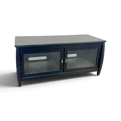 Sale Photo Thumbnail #149: Contemporary black wood media console featuring two glass-front doors with silver pulls and rear cable management cutouts.
