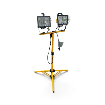 Sale Photo Thumbnail #231: Dual-head halogen work light on an adjustable yellow tripod stand, featuring protective wire guards and integrated power cords.
