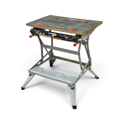 Sale Photo Thumbnail #237: Vintage Black & Decker Workmate 550 folding workbench and vise, showing some wear from use.