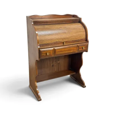 Sale Photo Thumbnail #124: Vintage oak roll-top desk featuring a tambour door, a single wide drawer with brass knobs, and a lower storage shelf.