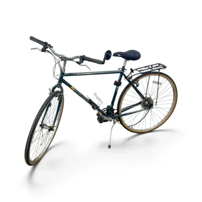 Sale Photo Thumbnail #219: Vintage Specialized Crossroads hybrid bicycle in dark green, featuring a rear cargo rack, kickstand, and water bottle holder.