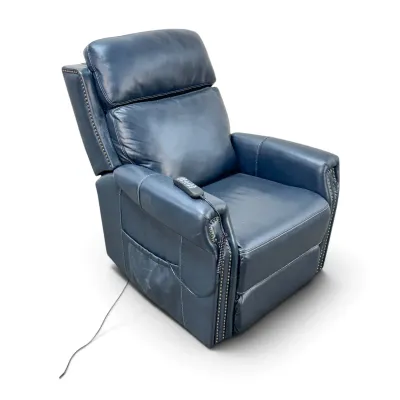 Sale Photo Thumbnail #158: Modern blue leather power recliner featuring brass nailhead trim and a wired remote control.