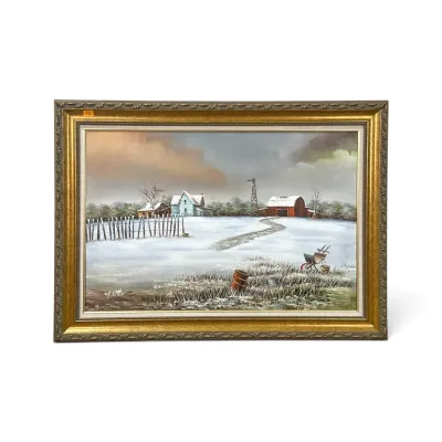 Sale Photo Thumbnail #139: Framed oil painting depicting a winter farm scene with barns and a windmill, signed by artist M. Otto, housed in an ornate gold-finished frame.