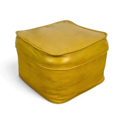 Sale Photo Thumbnail #88: Mid-century modern style square leather pouf ottoman in a mustard yellow hue, featuring piped edges.