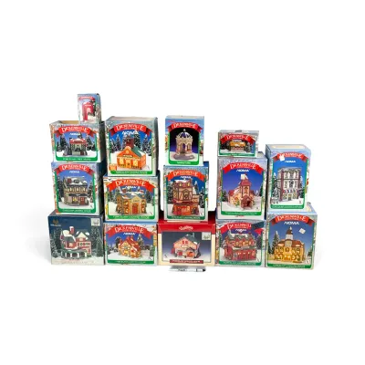 Sale Photo Thumbnail #32: Collection of vintage NOMA Dickensville Collectables porcelain lighted Christmas village houses and accessories, in their original boxes.