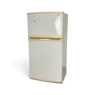 Sale Photo Thumbnail #263: Vintage Kenmore top-freezer refrigerator in white with cream-colored trim, showing some light wear and discoloration.