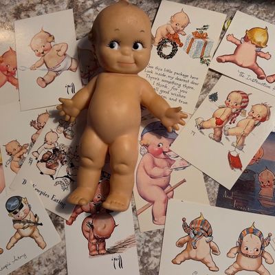 Kewpie doll and collector prints 