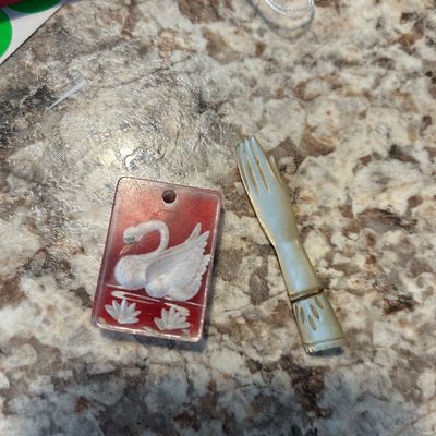 Swan pendant and mother of pearl carved hand pin 