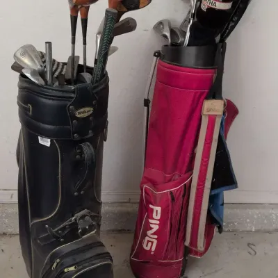 2 Sets of Golf Clubs & Bags – Titleist, Ping, TaylorMade, Wilson & GolfWorks