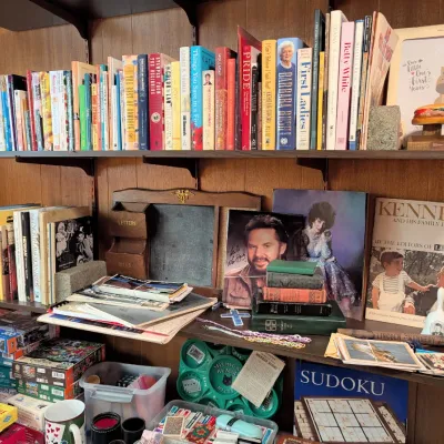 Sale Photo Thumbnail #82: Vintage Sheb. Co. plat books, autographed country artist photographs, vintage Bibles, and more!