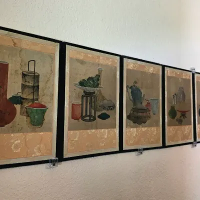 Set of vintage Asian scroll paintings mounted on panels, depicting various traditional vessels, scholars' objects, and ceramics.