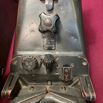 Sale Photo Thumbnail #8: Vintage German military optical device, marked 'blc' and 'Em 4m R 40', showing significant wear and original black finish. Local pick up only. 