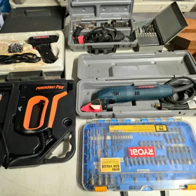 Sale Photo Thumbnail #42: Assorted power tools and accessories, including a Ryobi rotary tool, a PowerShot Pro electric staple gun, and a Ryobi 70-piece drilling and driving accessory kit.