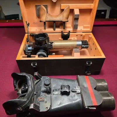Sale Photo Thumbnail #7: Vintage military optical equipment, including a large binocular-style device and a separate scope unit housed in its original fitted wooden transport case. Local pick up only.  