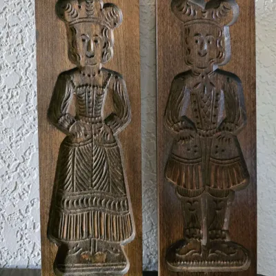 Sale Photo Thumbnail #45: Pair of vintage hand-carved wooden speculaas cookie molds depicting a traditional Dutch man and woman in folk attire.