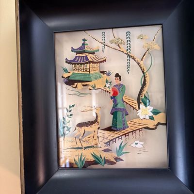 Mid-century Chinoiserie reverse glass painting depicting a woman, a deer, and a pagoda, housed in a deep shadowbox frame.