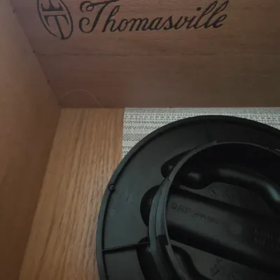 Sale Photo Thumbnail #76: Thomasville maker's mark stamped on the interior of a wooden drawer.